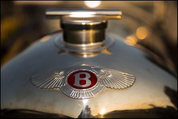 Picture 7  -  Red & Orange A winged badge from a 1926 Bentley 